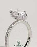 Kynora CJ 2ct marquise claw solitaire engagement ring with hidden halo and pave band showcasing sparkling diamond details