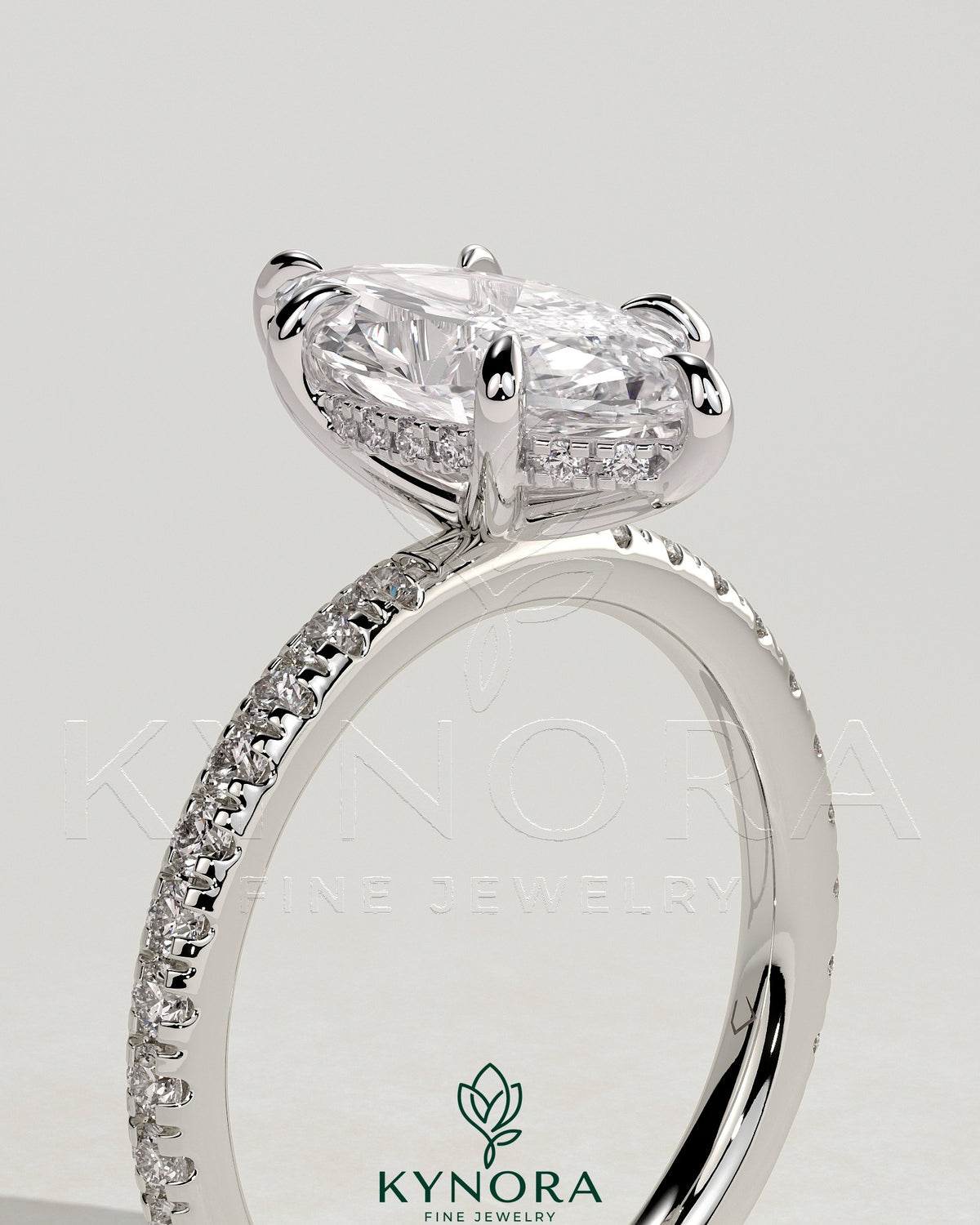 Kynora CJ 2ct marquise claw solitaire engagement ring with hidden halo and pave band showcasing sparkling diamond details