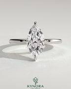 Kynora CJ 2ct marquise claw solitaire engagement ring with hidden halo and four prongs, sparkling diamond design