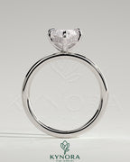 Kynora CJ 2ct marquise claw solitaire engagement ring with hidden halo and four prongs, showcasing elegant diamond setting.