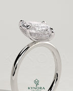 Kynora CJ 2ct marquise claw solitaire engagement ring with hidden halo and four-prong setting, showcasing elegant diamond design.