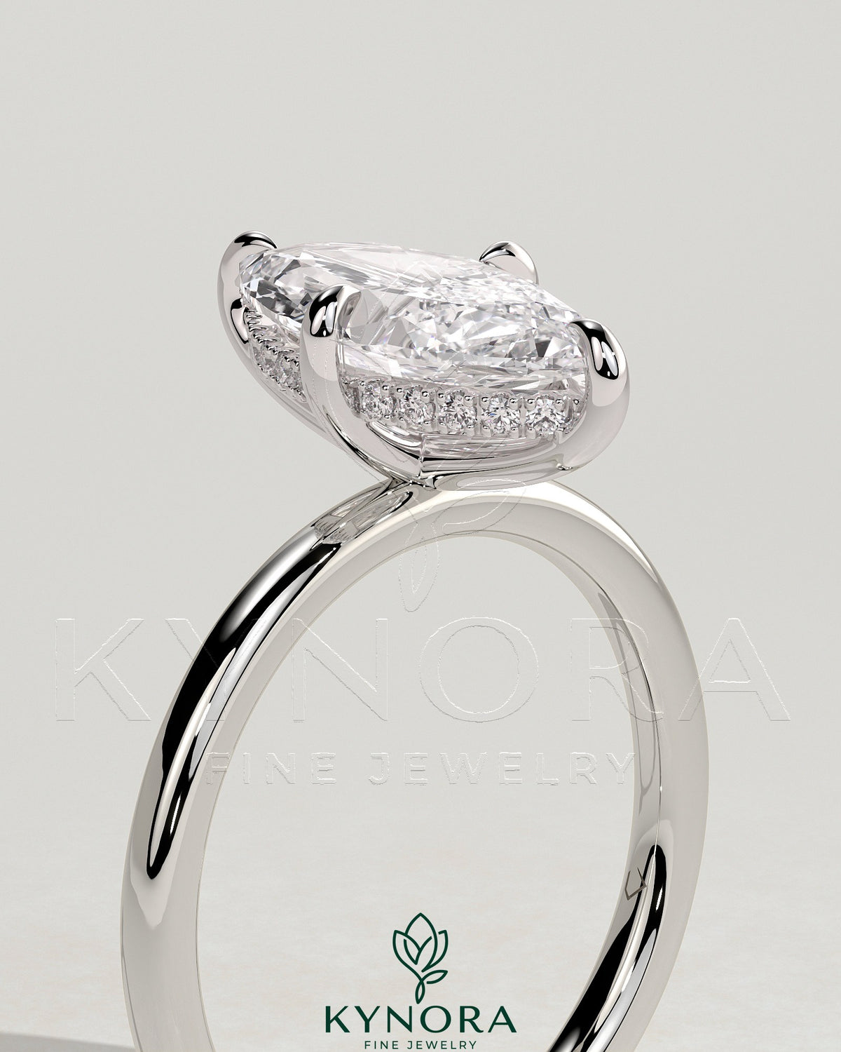 Kynora CJ 2ct marquise claw solitaire engagement ring with hidden halo and four-prong setting, showcasing elegant diamond design.