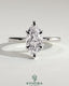 Kynora CJ 2ct marquise diamond solitaire engagement ring with hidden halo and six prong setting on a silver band.