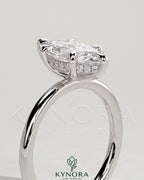 Kynora CJ 2ct marquise solitaire engagement ring with six-prong setting and hidden halo, showcasing elegant diamond craftsmanship.