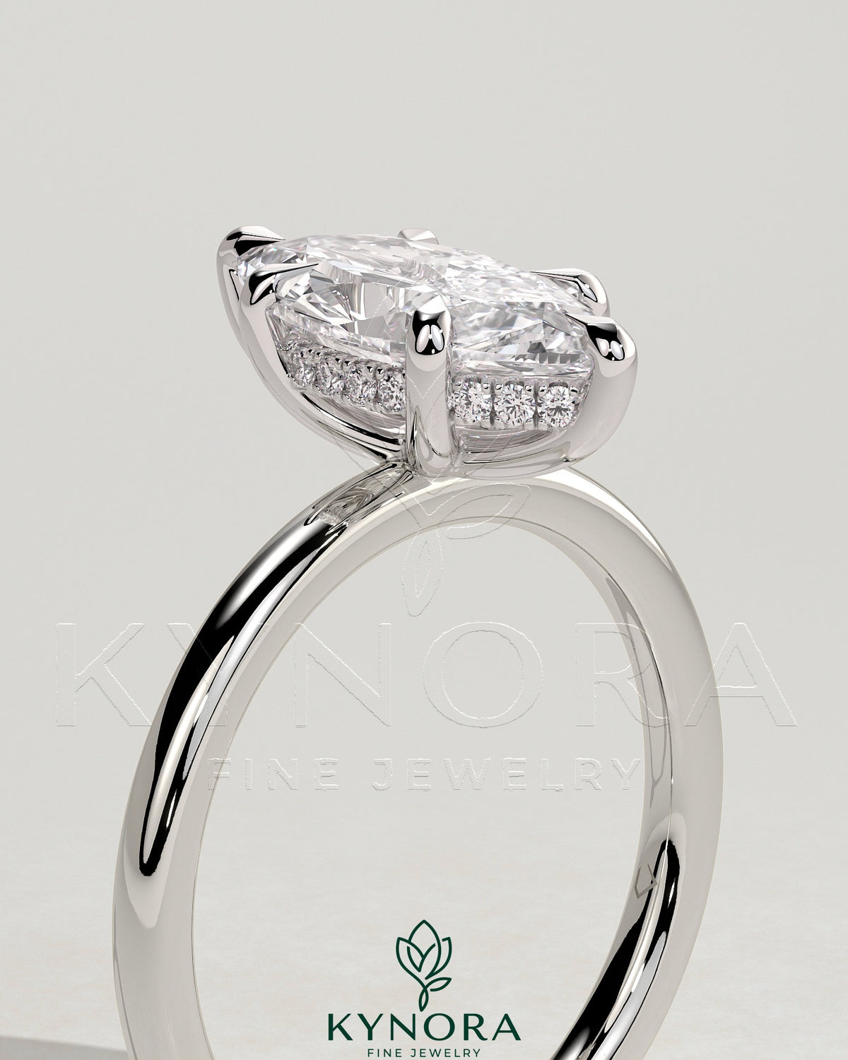 Kynora CJ 2ct marquise solitaire engagement ring with six-prong setting and hidden halo, showcasing elegant diamond craftsmanship.