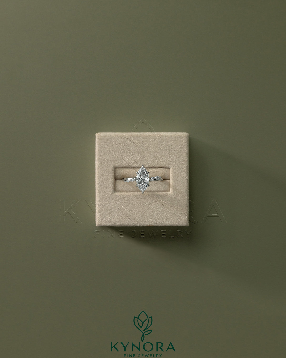 Kynora CJ 2ct marquise claw solitaire engagement ring with hidden halo, opposing marquise accents, cathedral high setting.