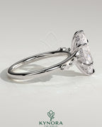 Kynora CJ 2ct marquise claw solitaire engagement ring with hidden halo, opposing marquise accents, cathedral high setting.