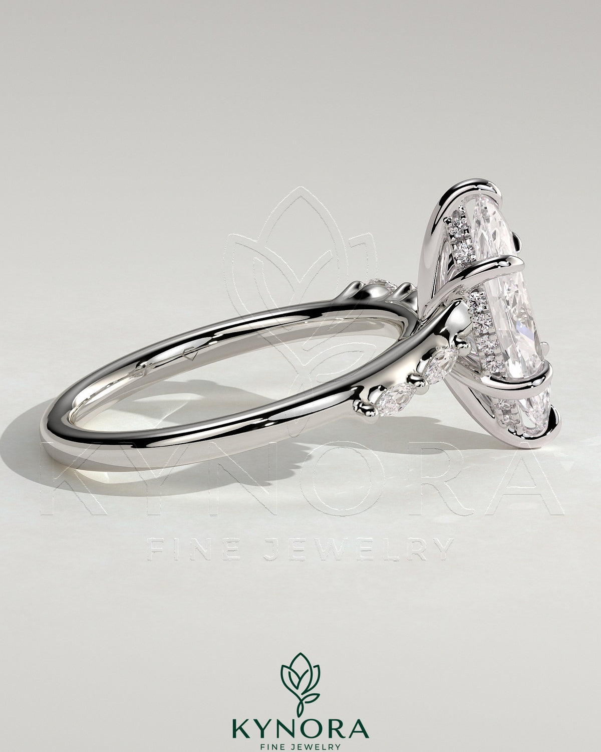 Kynora CJ 2ct marquise claw solitaire engagement ring with hidden halo, opposing marquise accents, cathedral high setting.