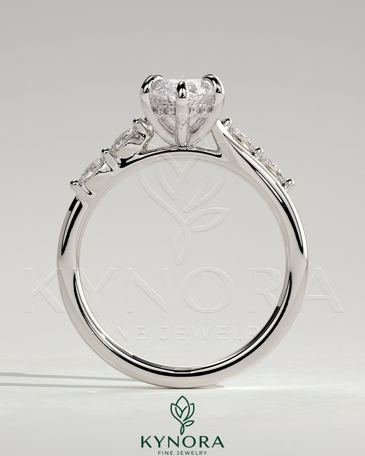 Kynora CJ 2ct marquise claw solitaire engagement ring with hidden halo, opposing marquise accents, cathedral high setting.