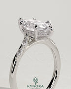 Kynora CJ 2ct marquise claw solitaire engagement ring with hidden halo, opposing marquise accents, cathedral high setting.