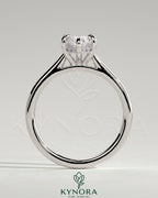 Kynora CJ 2ct marquise claw solitaire engagement ring with hidden halo, tapered band, and cathedral high setting.