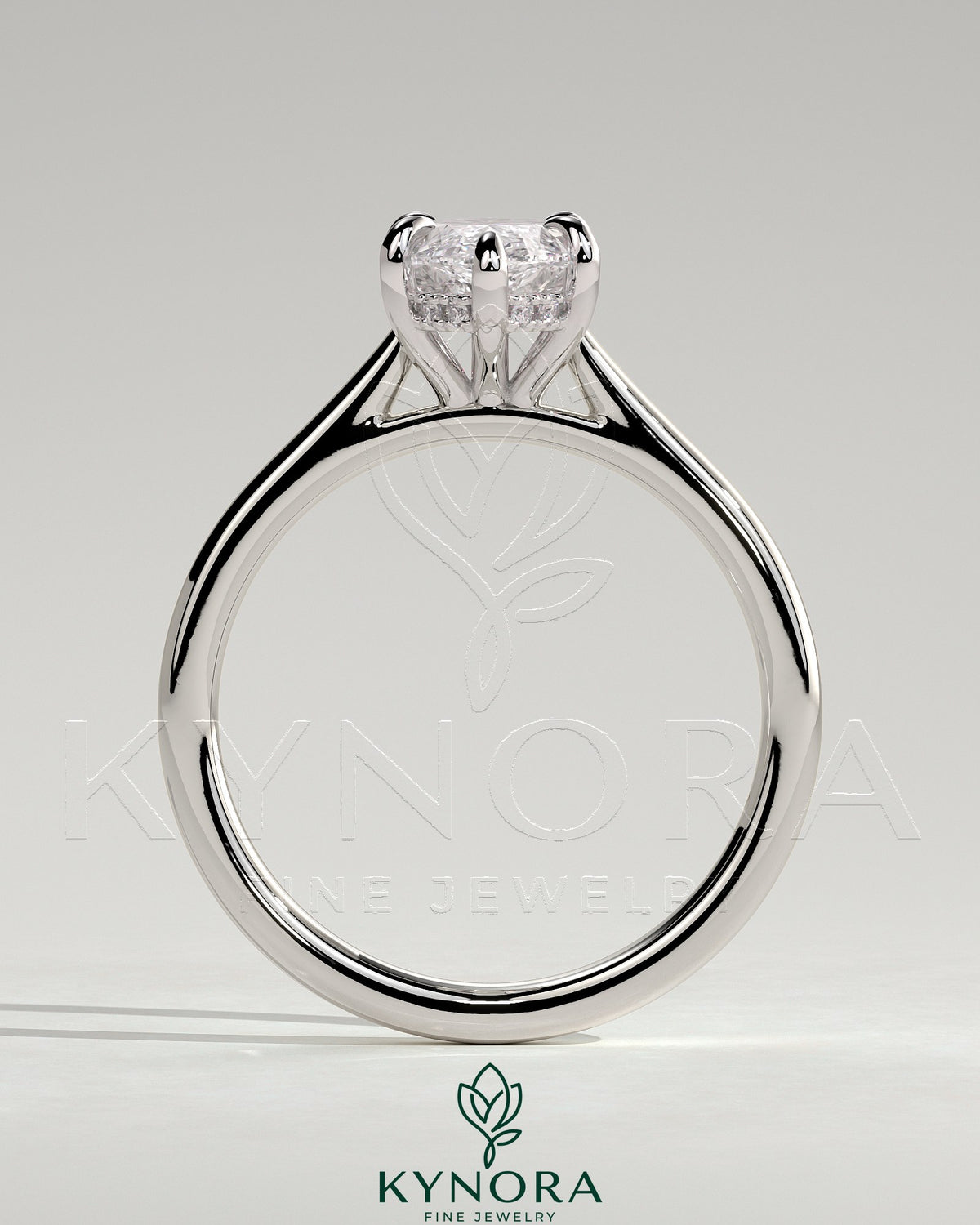 Kynora CJ 2ct marquise claw solitaire engagement ring with hidden halo, tapered band, and cathedral high setting.