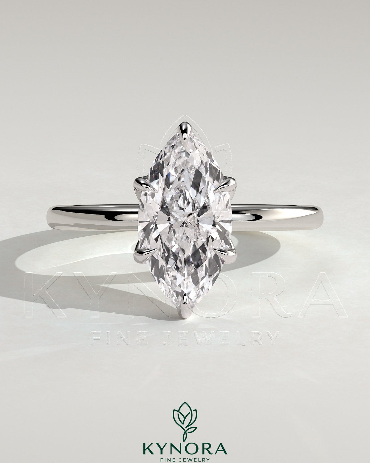 Kynora CJ 2ct marquise claw solitaire engagement ring with petal gallery and accent leaf details, crafted in elegant gold. Main image