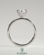 Kynora CJ 2ct marquise claw solitaire engagement ring with petal gallery and leaf accent details, showcasing elegant jewelry design.