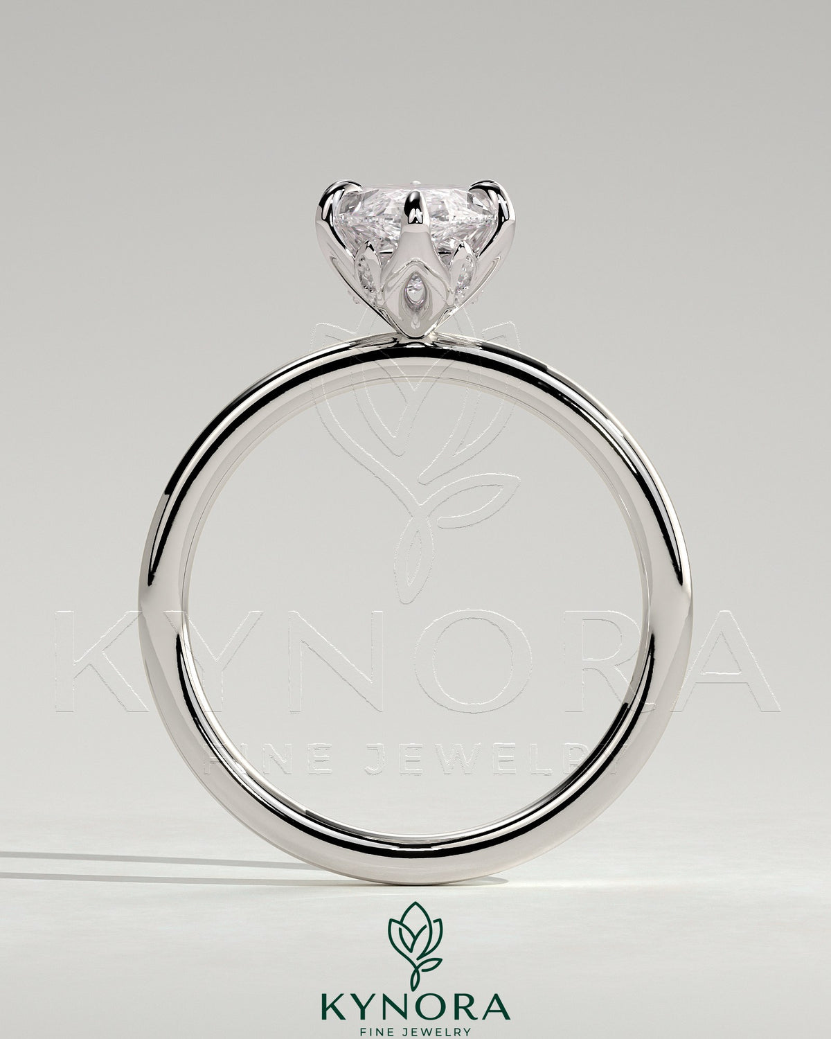 Kynora CJ 2ct marquise claw solitaire engagement ring with petal gallery and leaf accent details, showcasing elegant jewelry design.