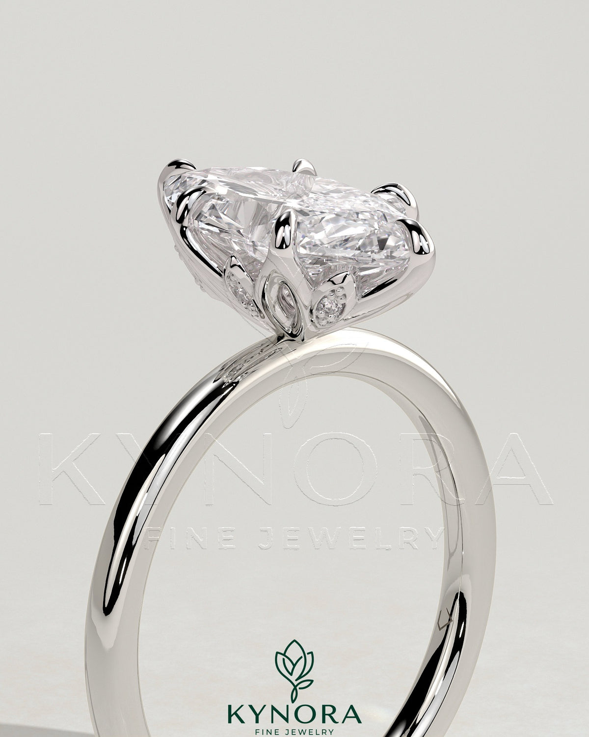 Kynora CJ 2ct marquise claw solitaire engagement ring with petal gallery and accent leaf details, crafted in elegant gold.
