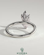 Kynora CJ 2ct marquise claw solitaire engagement ring with petal gallery design, showcasing a sparkling marquise diamond and intricate band.