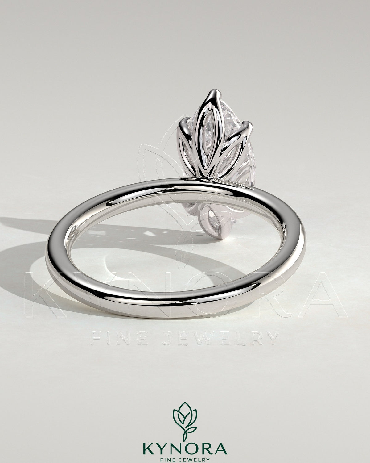 Kynora CJ 2ct marquise claw solitaire engagement ring with petal gallery design, showcasing a sparkling marquise diamond and intricate band.