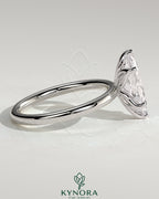 Kynora CJ 2ct marquise claw solitaire engagement ring with petal gallery design and sparkling diamond setting.
