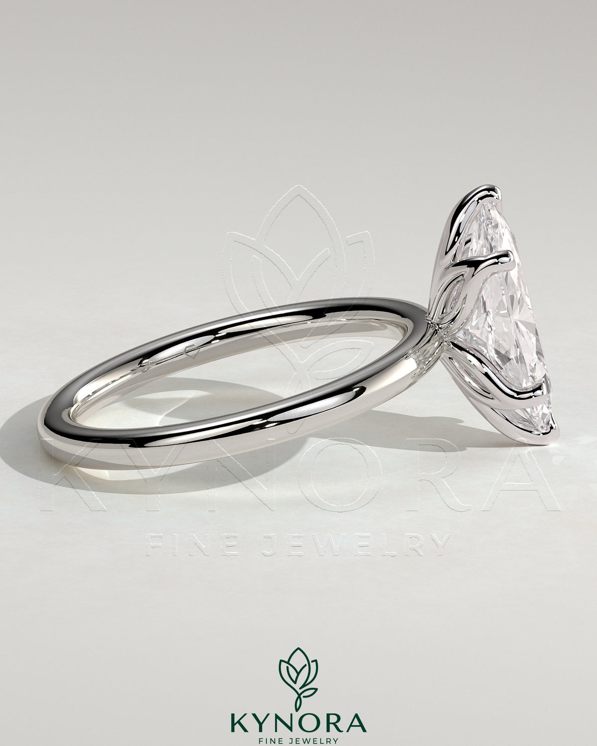 Kynora CJ 2ct marquise claw solitaire engagement ring with petal gallery design and sparkling diamond setting.