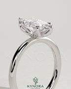 Kynora CJ 2ct marquise claw solitaire engagement ring with petal gallery design, featuring a sparkling central diamond.