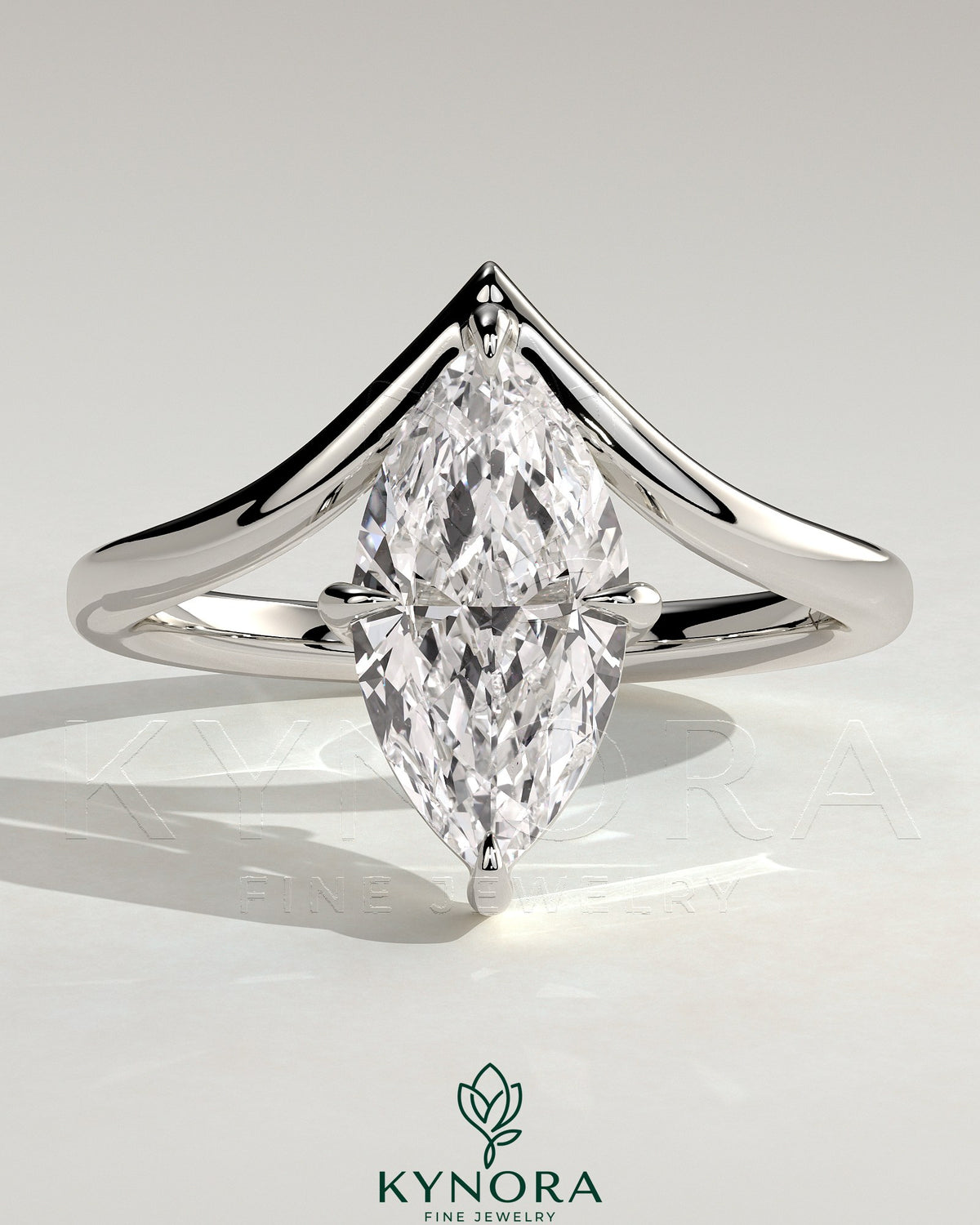 Kynora CJ 2ct marquise claw solitaire engagement ring with V-shaped band, featuring a sparkling marquise-cut diamond. Main image