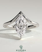 Kynora CJ 2ct marquise claw solitaire engagement ring with V-shaped band, featuring a sparkling marquise-cut diamond.