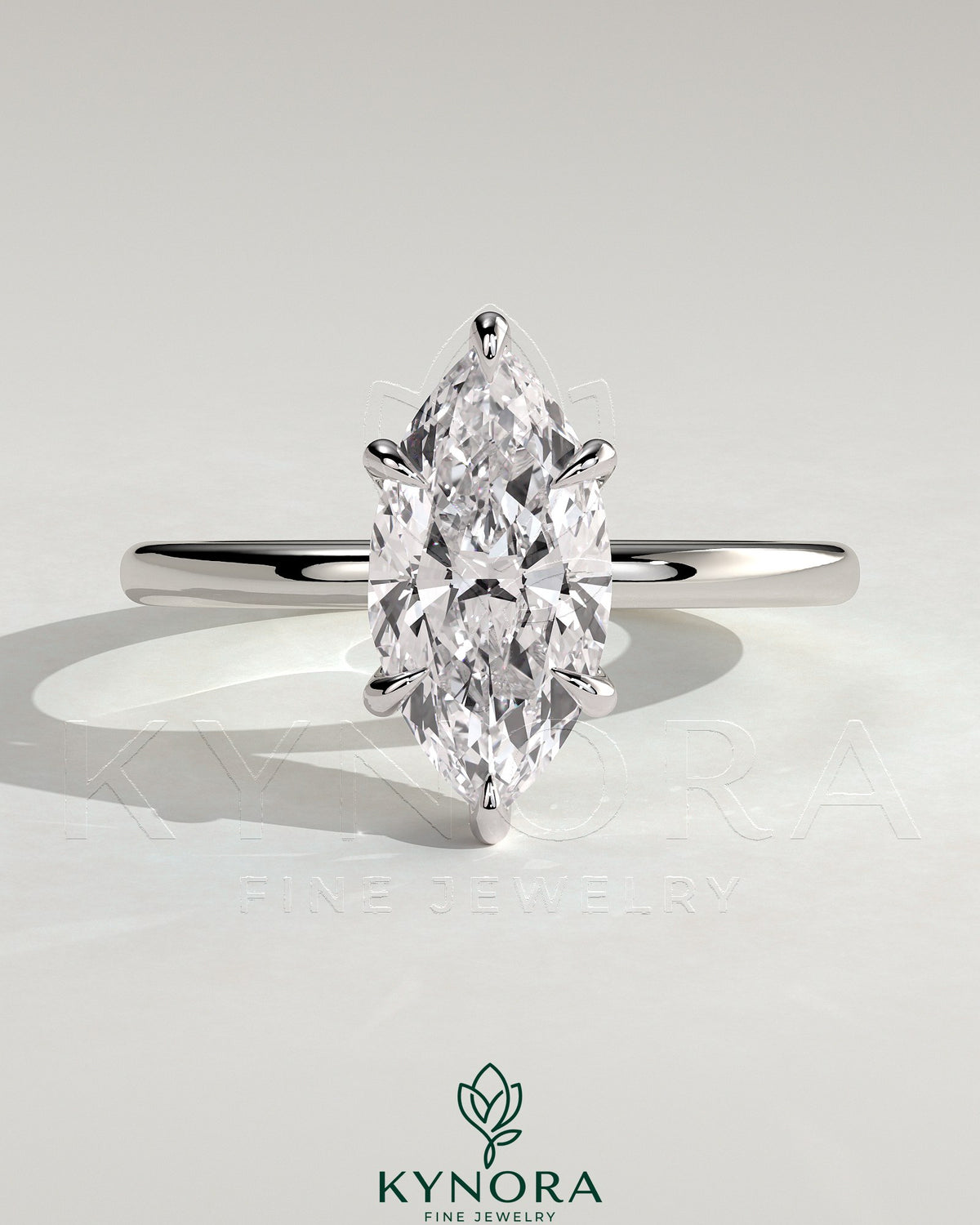 Kynora CJ 2ct marquise claw solitaire engagement ring with a wrap-around hidden halo, showcasing elegant diamond craftsmanship. Main image