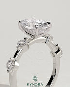 Kynora CJ 2ct oval claw solitaire engagement ring with four round accent stones and a hidden halo design.