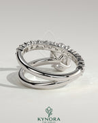 Kynora CJ 2ct oval claw solitaire engagement ring with angled pave band, featuring a stunning oval diamond and elegant design.