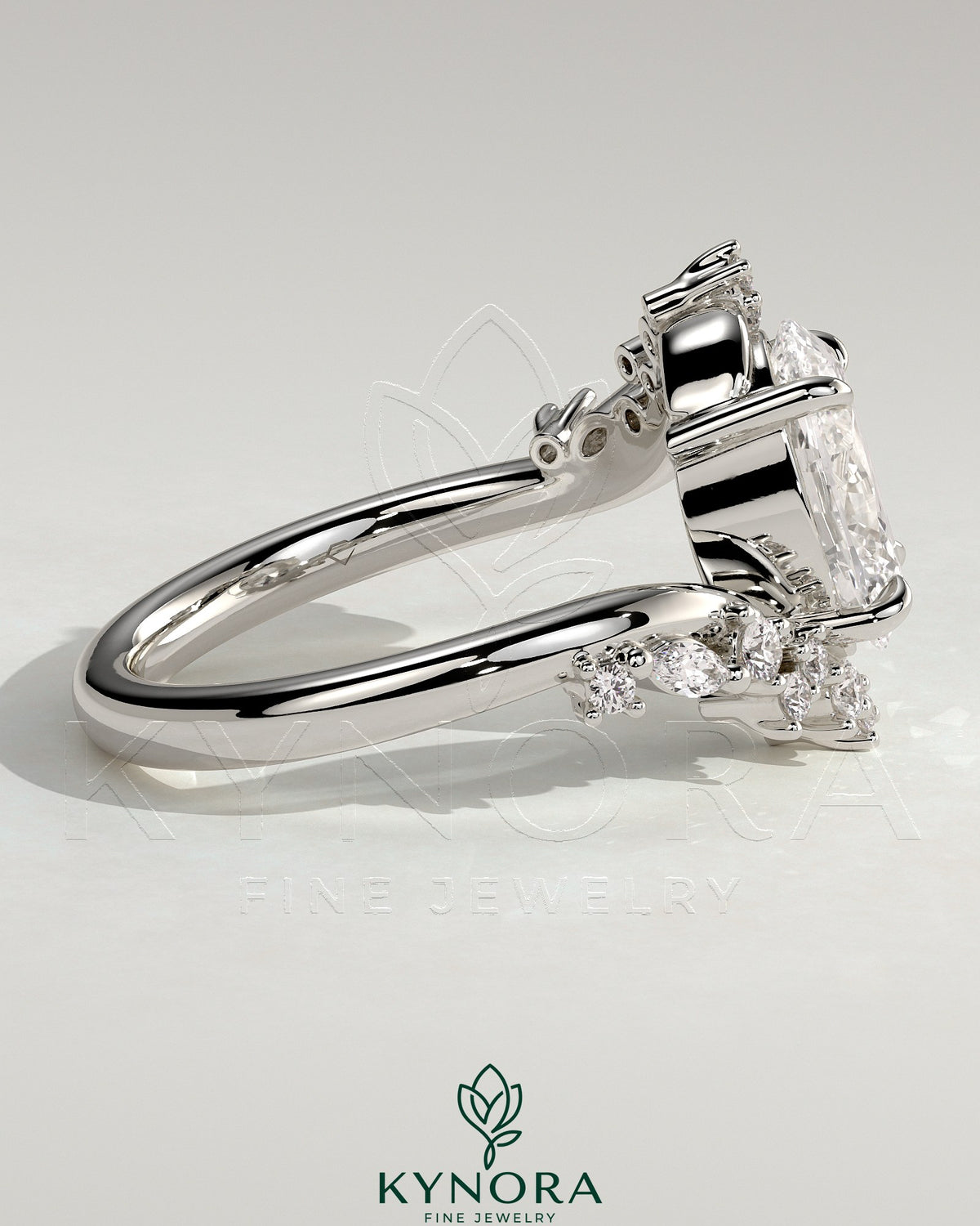 Kynora CJ 2ct oval claw solitaire engagement ring with bypass band and clustered round-marquise accent stones, elegant jewelry piece.