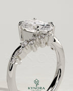 Kynora CJ 2ct oval claw solitaire engagement ring with bypass band and clustered round-marquise accent stones, platinum finish