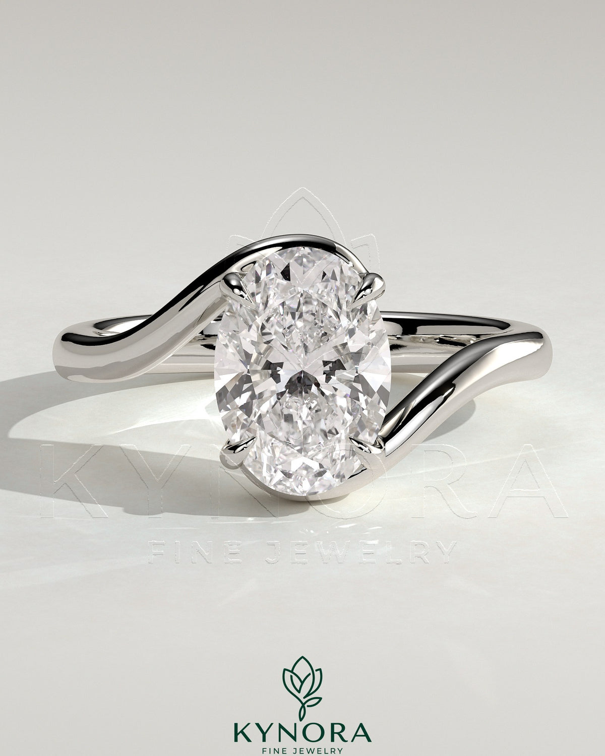 Kynora CJ 2ct oval claw solitaire engagement ring with bypass band, showcasing a sparkling oval diamond and sleek gold setting Main image