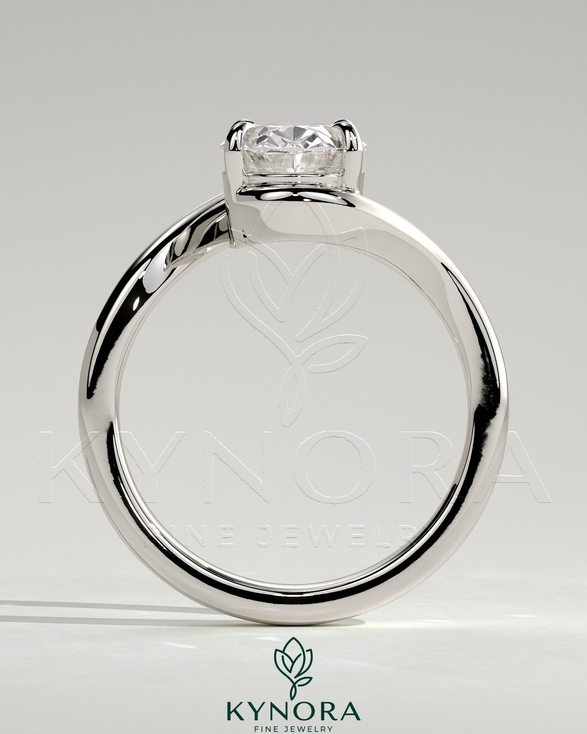 Kynora CJ 2-carat oval claw solitaire engagement ring with bypass band showcasing a sparkling center stone and intricate band design.