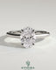 Kynora CJ 2ct oval claw solitaire engagement ring with cathedral high setting and intricate band design.