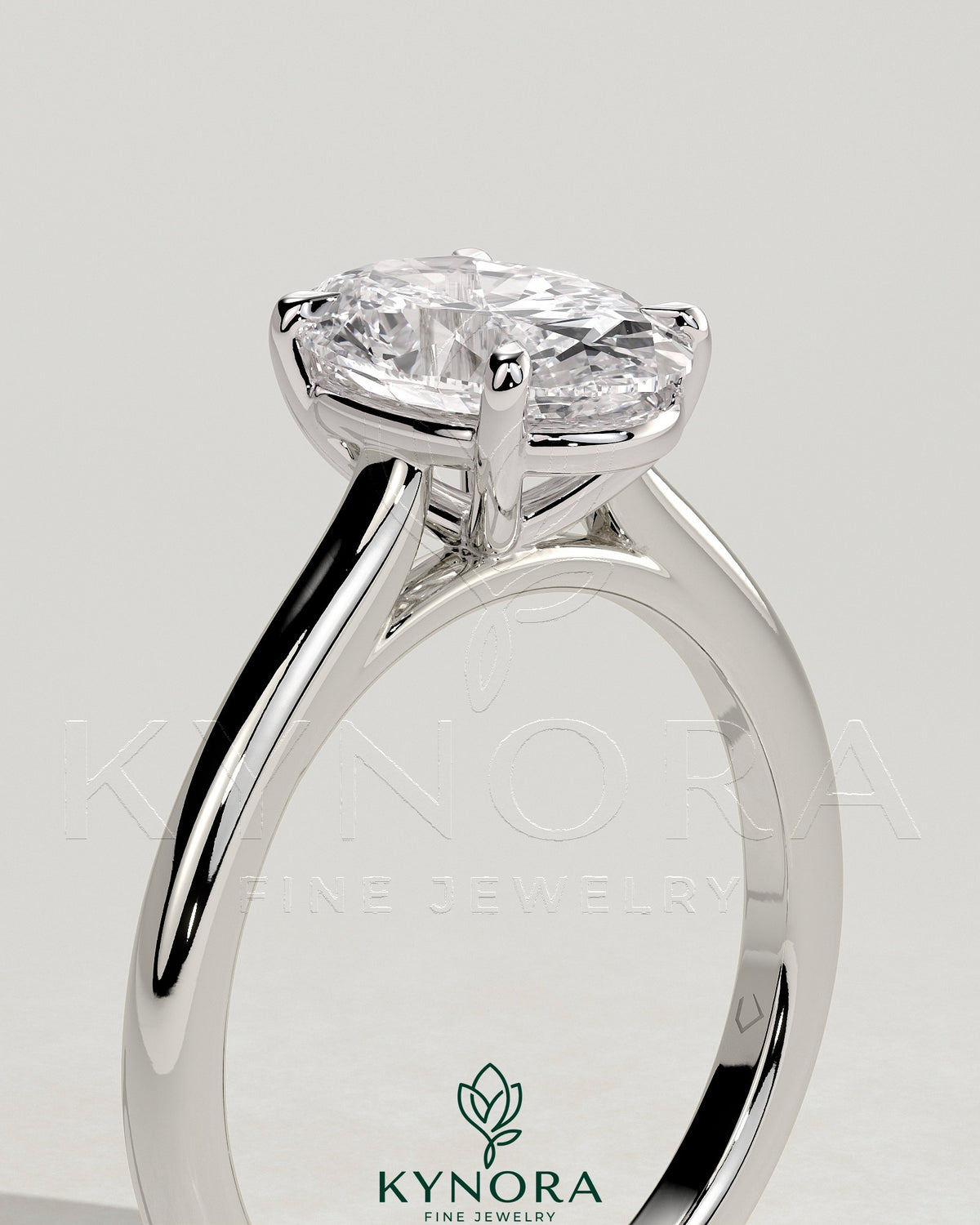 Kynora CJ 2ct oval claw solitaire engagement ring with cathedral high setting showcasing the sparkling center stone and elegant band.