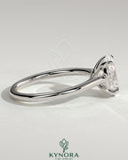 Kynora CJ 2ct oval claw solitaire engagement ring with cathedral low setting and open trellis gallery design.