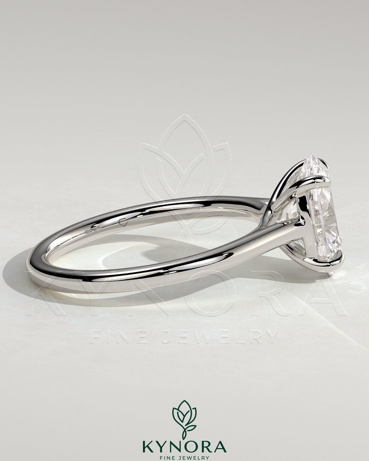 Kynora CJ 2ct oval claw solitaire engagement ring with cathedral low setting and open trellis gallery design.