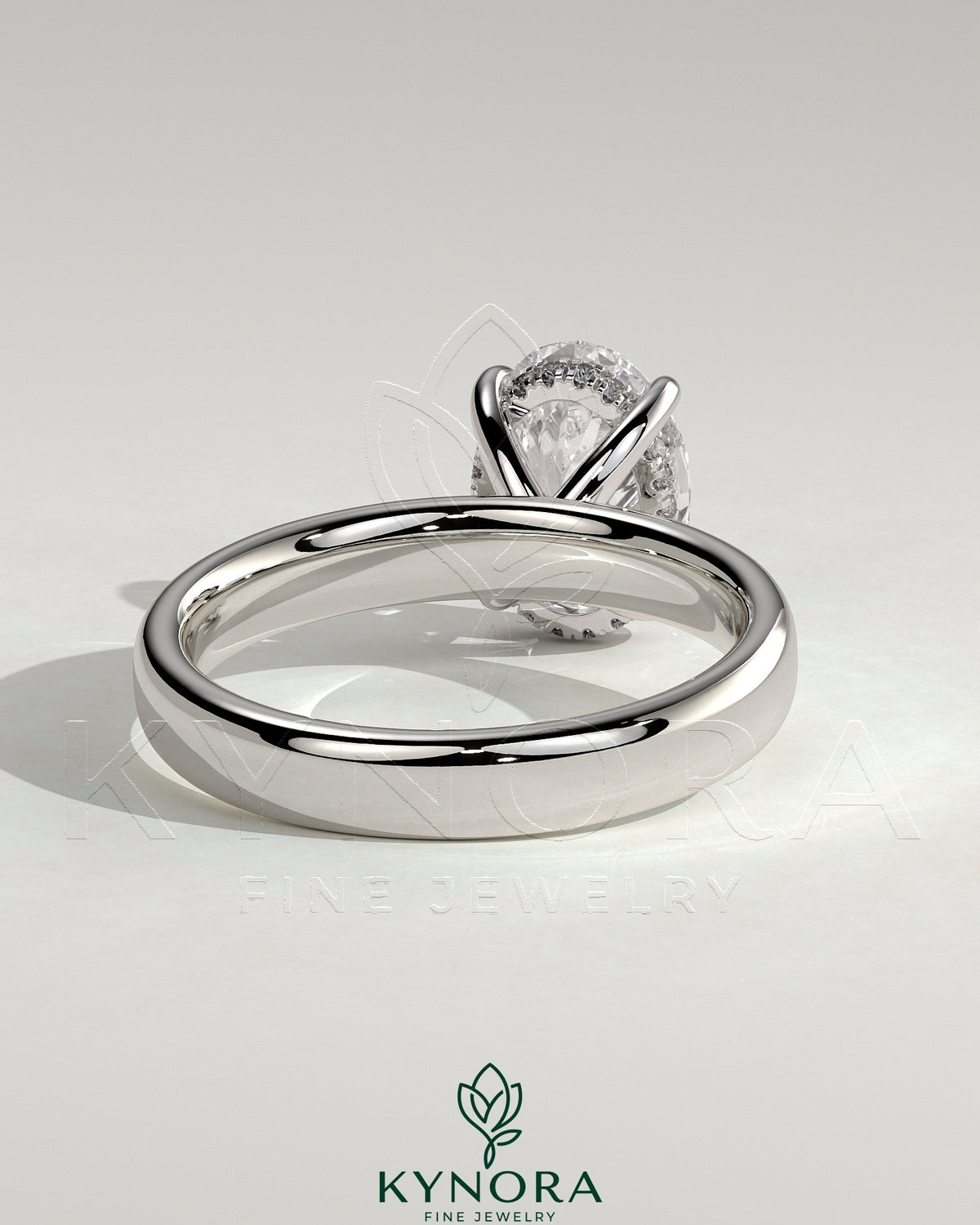Kynora CJ 2ct oval diamond solitaire engagement ring with cigar band and hidden halo in sterling silver.