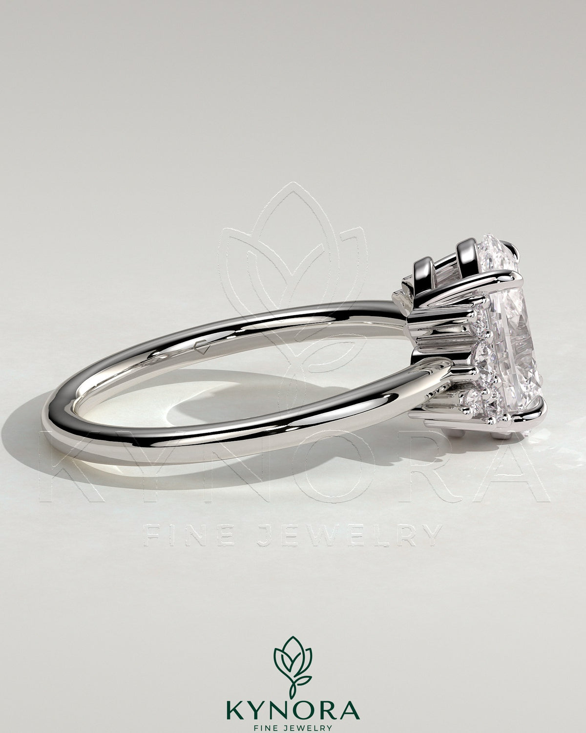 Kynora CJ 2ct oval claw solitaire engagement ring with clustered round shoulder stones, elegant and sparkling jewelry piece