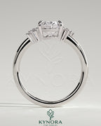 Kynora CJ 2ct oval claw solitaire engagement ring with clustered round shoulder stones, elegant and sparkling jewelry piece.