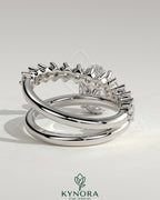 Kynora CJ 2ct oval claw solitaire engagement ring with double band featuring plain and round accent stones.