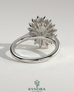 Kynora CJ 2ct oval claw solitaire engagement ring with double sunburst halo and cathedral high setting.