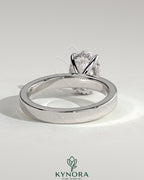 Kynora CJ 2ct oval claw solitaire engagement ring with flat cigar band and hidden halo in sterling silver
