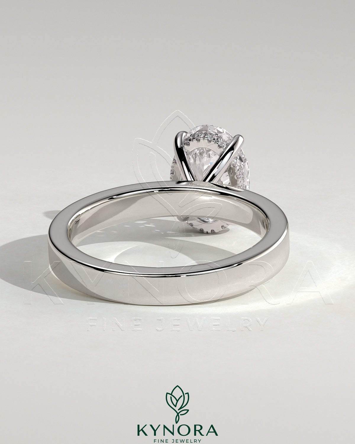 Kynora CJ 2ct oval claw solitaire engagement ring with flat cigar band and hidden halo in sterling silver