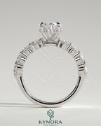 Kynora CJ 2ct oval claw solitaire engagement ring with half eternity oval band and hidden halo, showcasing sparkling diamond details.
