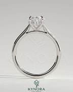 Kynora CJ 2ct oval claw solitaire engagement ring with hidden halo and cathedral high setting, showcasing intricate design and sparkling diamond.