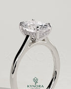 Kynora CJ 2ct oval claw solitaire engagement ring with hidden halo and cathedral high setting in sterling silver.