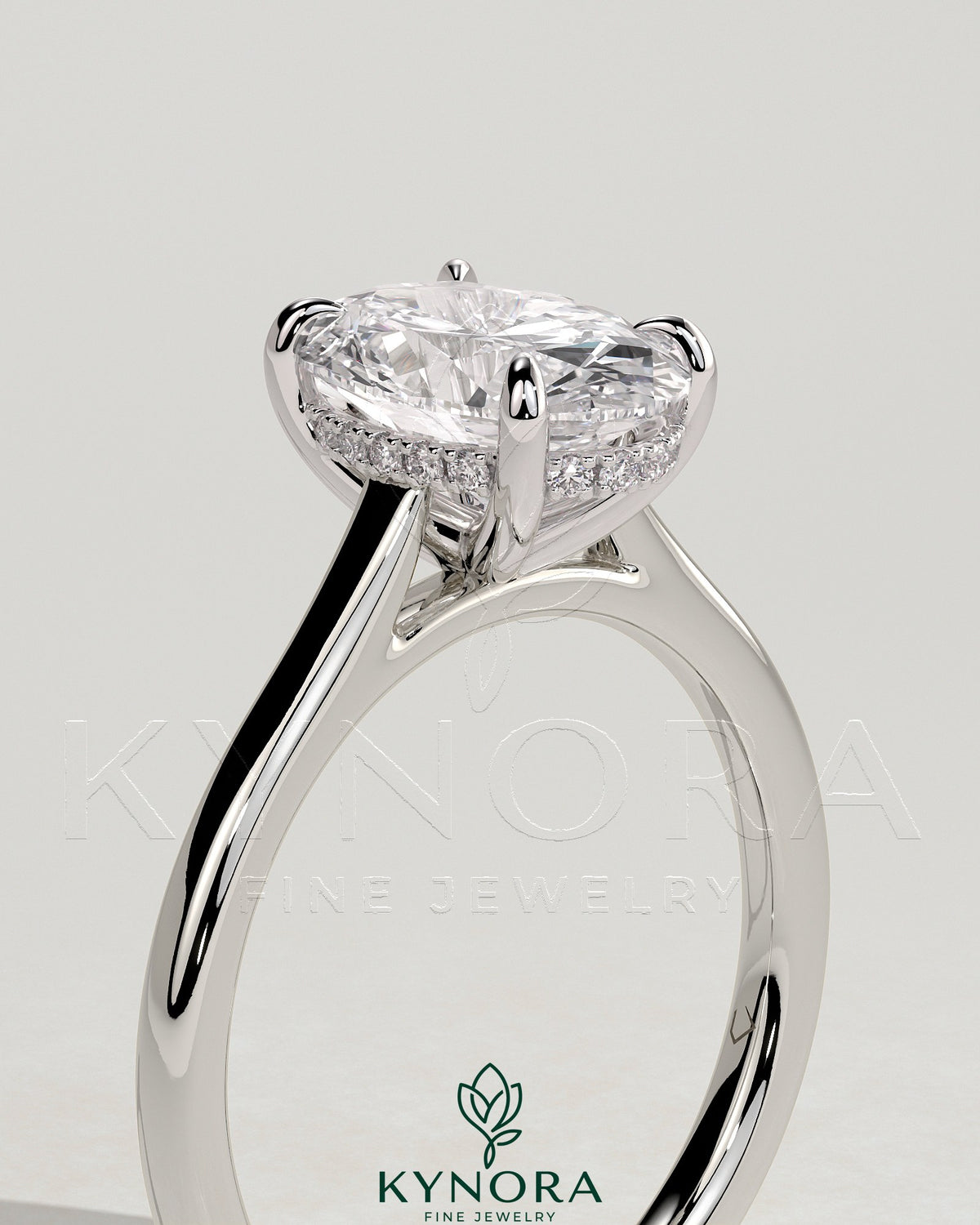 Kynora CJ 2ct oval claw solitaire engagement ring with hidden halo and cathedral high setting in sterling silver.