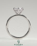 Kynora CJ 2ct oval claw solitaire engagement ring with hidden halo and compass rotation design, showcasing intricate craftsmanship.